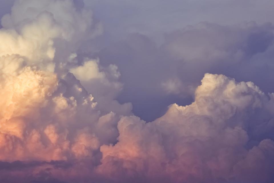 Sunlit clouds at dusk